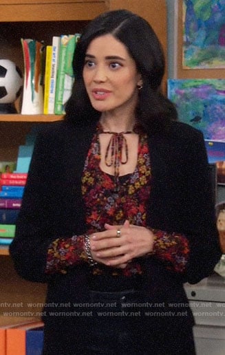 Sofia’s floral blouse with tie on The Neighborhood