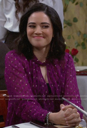 Sofia’s metallic pink keyhole blouse on The Neighborhood