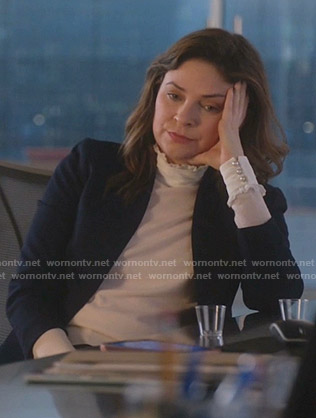 Taylor’s pink ruffle neck sweater on Bull