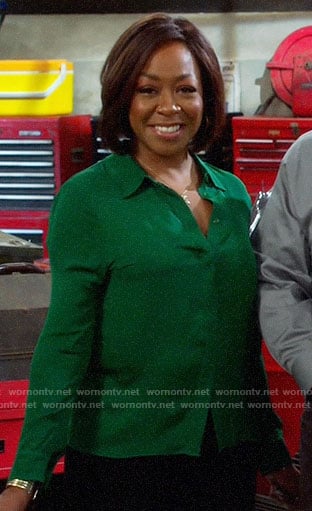 Tina’s green button down blouse on The Neighborhood