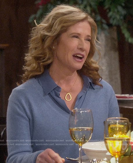 Vanessa’s blue v-neck sweater and button down blouse on Last Man Standing