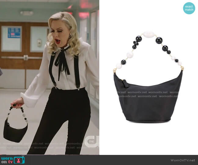 Cult Gaia Gia shoulder bag worn by Alexis Carrington (Elaine Hendrix) on Dynasty