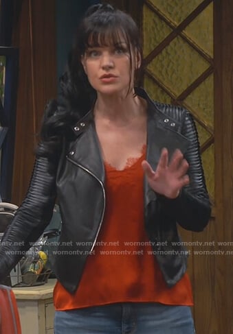 Jackie’s orange lace cami and black leather jacket on Broke
