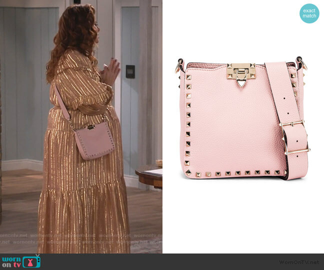 Valentino Garavani Rockstud messenger bag worn by Grace Adler (Debra Messing) on Will and Grace