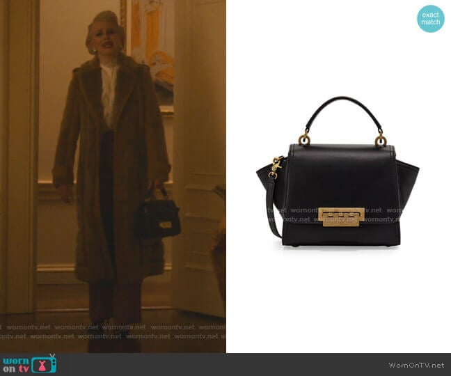 ZAC Zac Posen Eartha Iconic Mini Leather Crossbody Bag worn by  Gloria Grandbilt (Katherine LaNasa) on Katy Keene