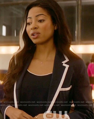 Alexandra’s navy blazer with white trim on Katy Keene