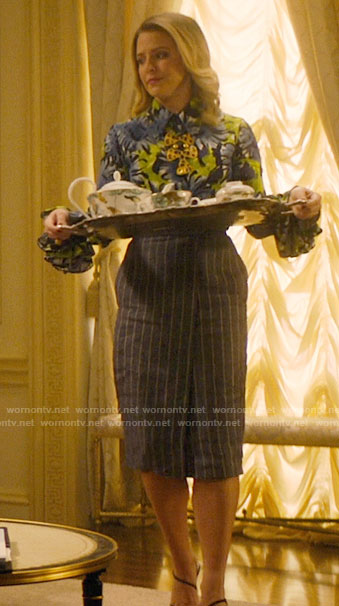 Amanda’s floral blouse and pinstripe skirt on Katy Keene