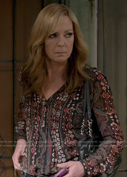 Bonnie’s black printed pintuck top on Mom