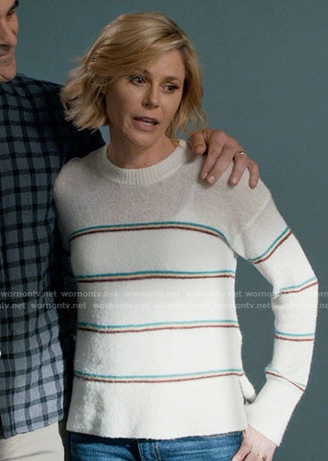 Claire’s white striped sweater on Modern Family