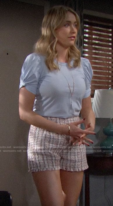 Flo’s blue twisted sleeve top and tweed shorts on The Bold and the Beautiful