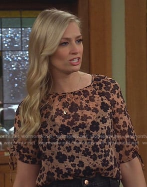 Gemma’s beige floral top on The Neighborhood