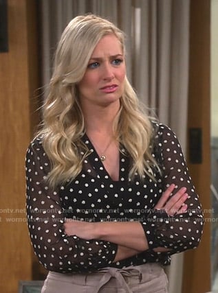Gemma’s black floral sheer blouse on The Neighborhood
