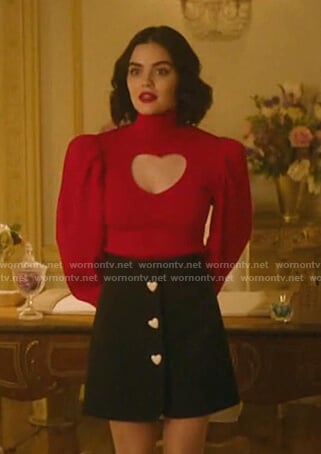 Katy’s red cutout sweater and black skirt on Katy Keene