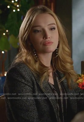 Kirby’s black chain print blouse on Dynasty