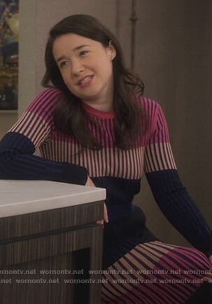 Marissa’s pink ribbed colorblock sweater and skirt on The Good Fight
