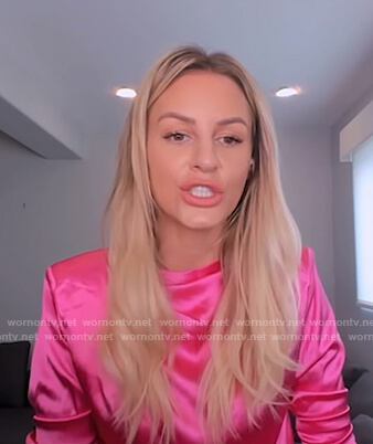 Morgan’s pink satin top and leather pants on E! News Nightly Pop
