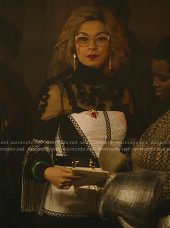 Pepper’s white fringe sleeve dress on Katy Keene