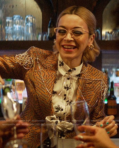 Pepper’s white floral shirt and gold printed blazer on Katy Keene