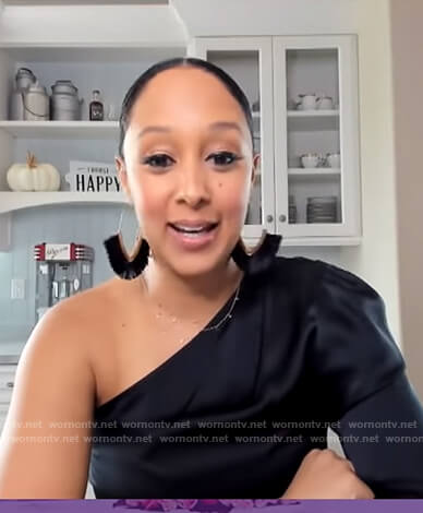 Tamera’s black one shoulder satin bodysuit on The Real