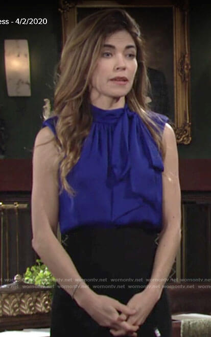 Victoria’s sleeveless blue tie neck blouse on The Young and the Restless