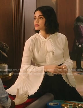 Katy’s white tie neck pleated bell sleeve blouse on Katy Keene