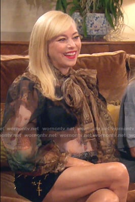 Sutton’s print tie neck sheer blouse and embellished mini skirt on The Real Housewives of Beverly Hills