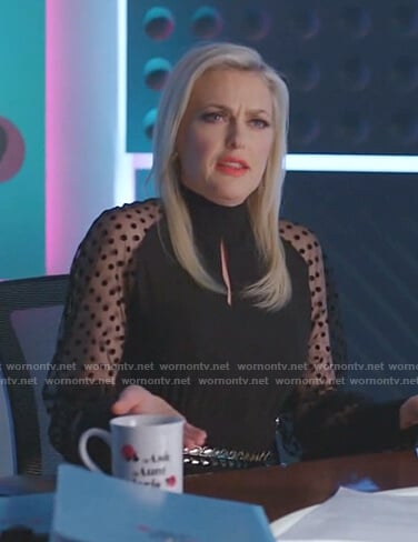 Alexis’s black polka dot sheer sleeve dress on Dynasty