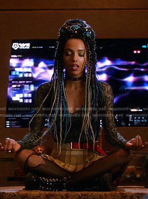 Charlie’s snake print mesh top and yellow pleated mini skirt on Legends of Tomorrow