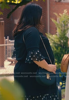 Dana’s black lock embellished shoulder bag on Sweet Magnolias