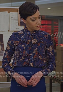 Lucca’s blue paisley print tie neck blouse on The Good Fight