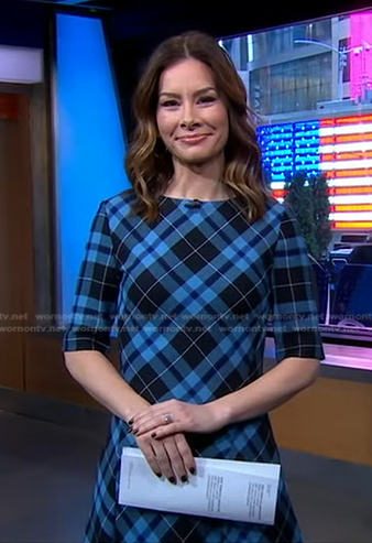 Rebecca Jarvis’s blue plaid midi dress on Good Morning America