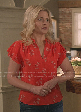 Stephanie’s red floral flutter sleeve top on Good Witch