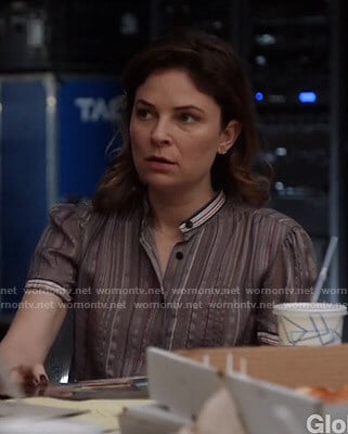 Taylor’s grey striped short sleeve top on Bull