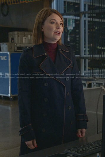 Taylor’s navy trench coat with piping trim on Bull
