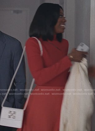 Molly’s white cross body bag on Insecure