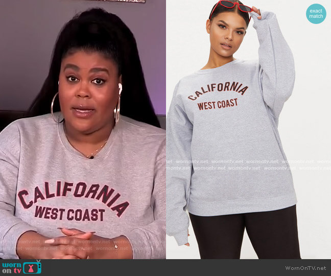Pretty Little Thing Plus California Slogan Oversized Sweater worn by Nina Parker on E! News