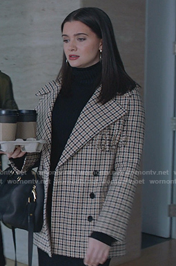 Jane’s beige fringed plaid coat on The Bold Type
