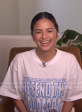 Erin’s white oversized graphic tee on E! News Daily Pop