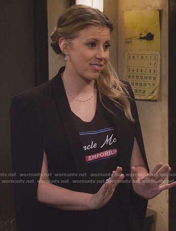 Stephanie’s black cape blazer on Fuller House
