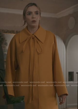 Villanelle’s yellow tie neck coat on Killing Eve