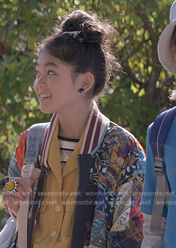 Claudia’s mixed print bomber jacket on The Baby-Sitters Club