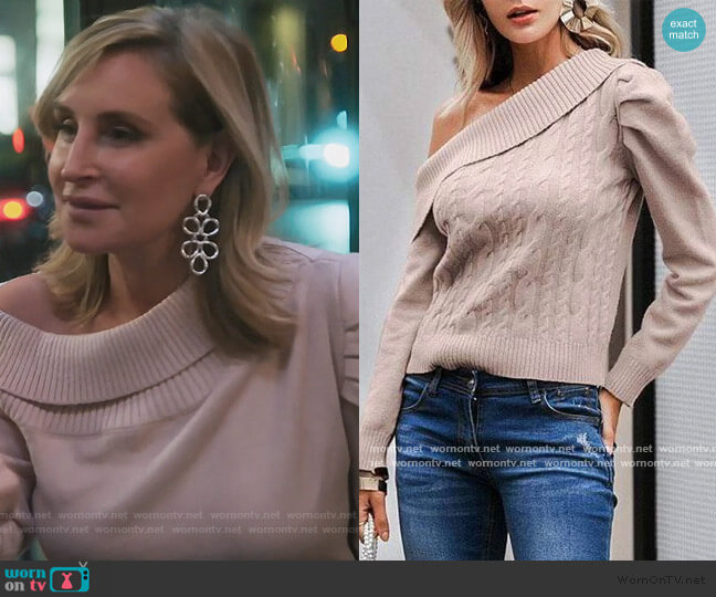 Sonja Off Shoulder Cable Knit Sweater worn by Sonja Morgan on The Real Housewives of New York City