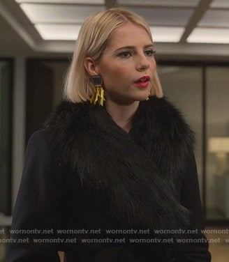 Astrid’s black coat with fur collar on The Politician