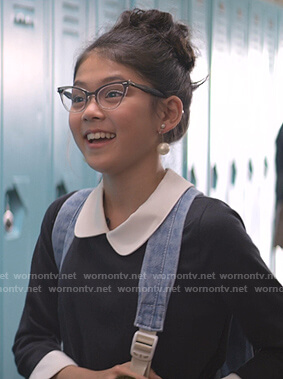Claudia’s black contrast trim dress on The Baby-Sitters Club
