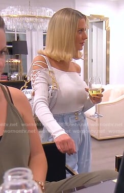 Dorit’s white lace-up sleeve top and jeans on The Real Housewives of Beverly Hills