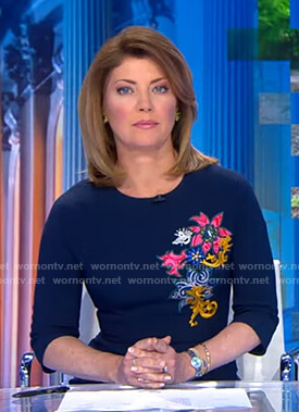 Norah’s navy floral embroidered dress on CBS Evening News