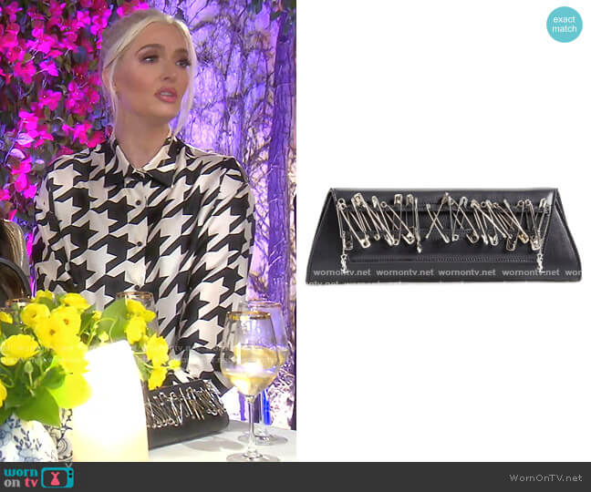 Saint Laurent Punk Safety Pin Lambskin Leather Clutch worn by Erika Jayne on The Real Housewives of Beverly Hills