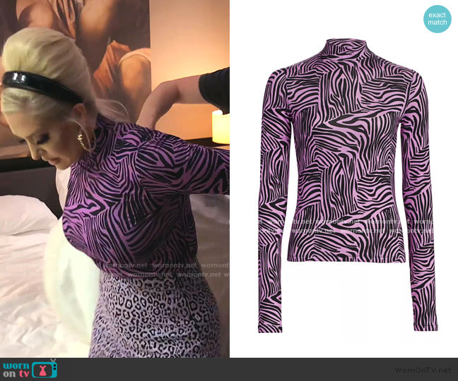 Andamane Beth Zebra-Print Turtleneck Top worn by Erika Jayne on The Real Housewives of Beverly Hills