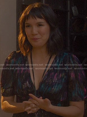 Katie’s black metallic v-neck dress on The High Note