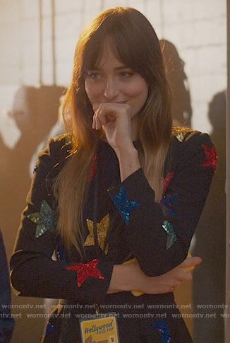Maggie’s black star embellished romper on The High Note